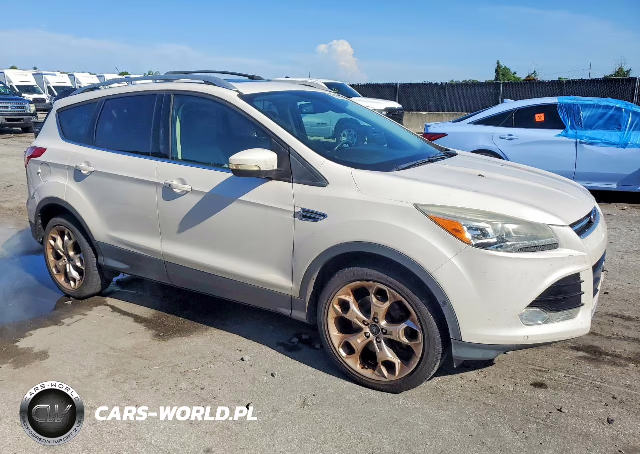 2016 Ford Escape Titanium VIN:1FMCU9J92GUA81598 - 4