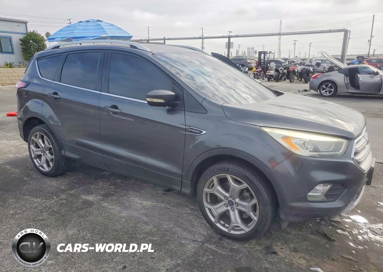 2017 Ford Escape Titanium VIN:1FMCU0J93HUD66467 - 4