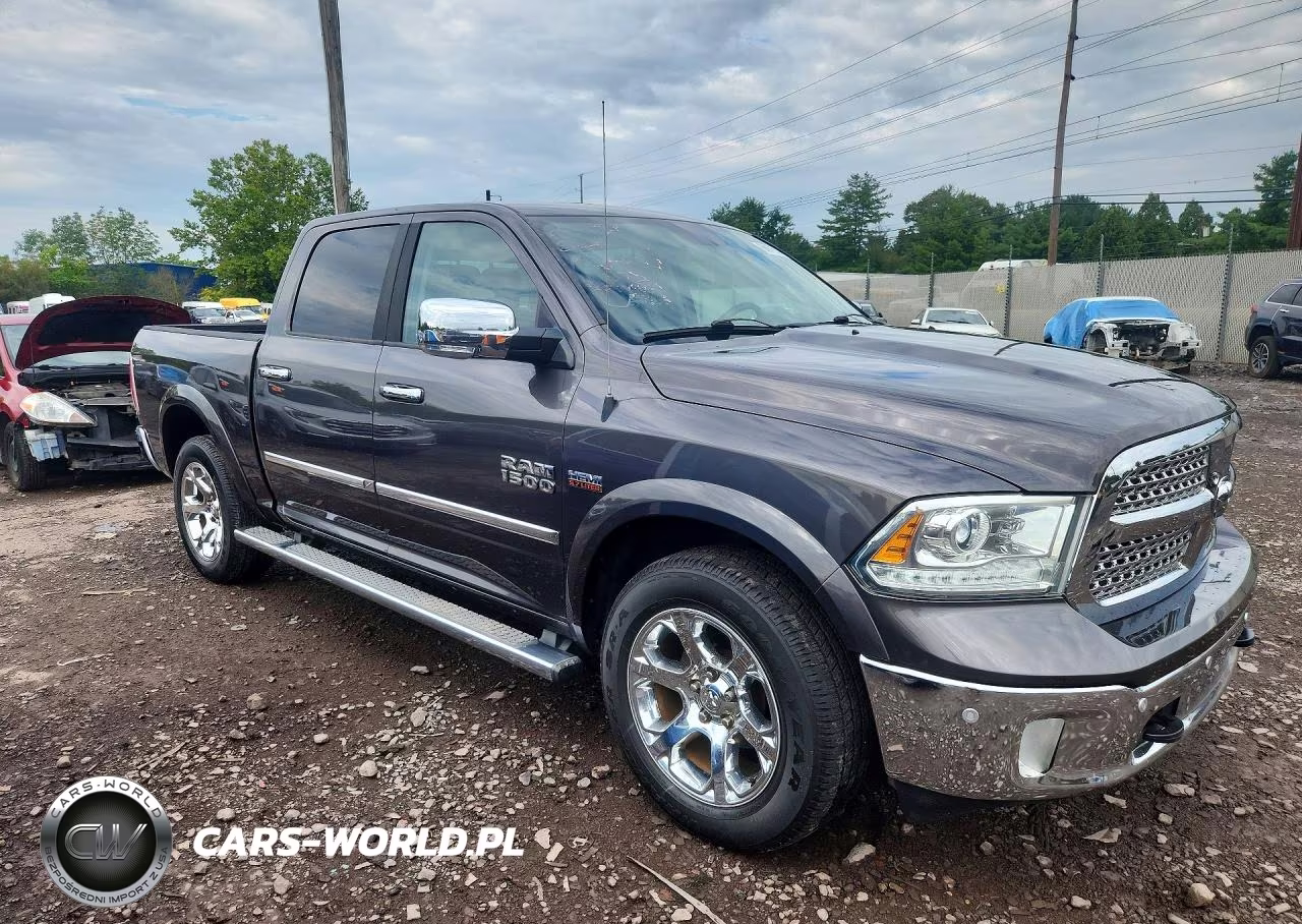 2015 Ram 1500 Laramie VIN:1C6RR7NT6FS564409 - 4