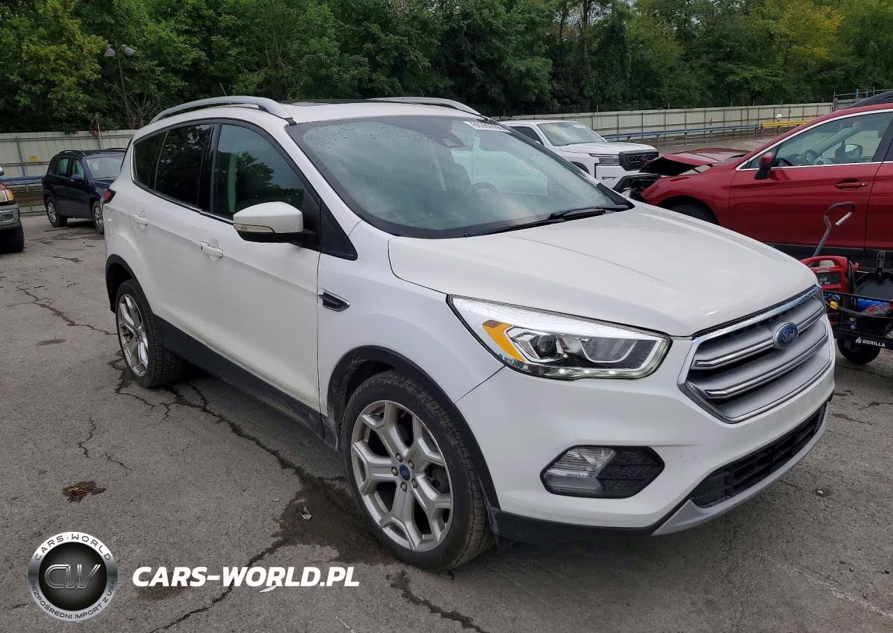 2017 Ford Escape Titanium VIN:1FMCU9J98HUE21600 - 4