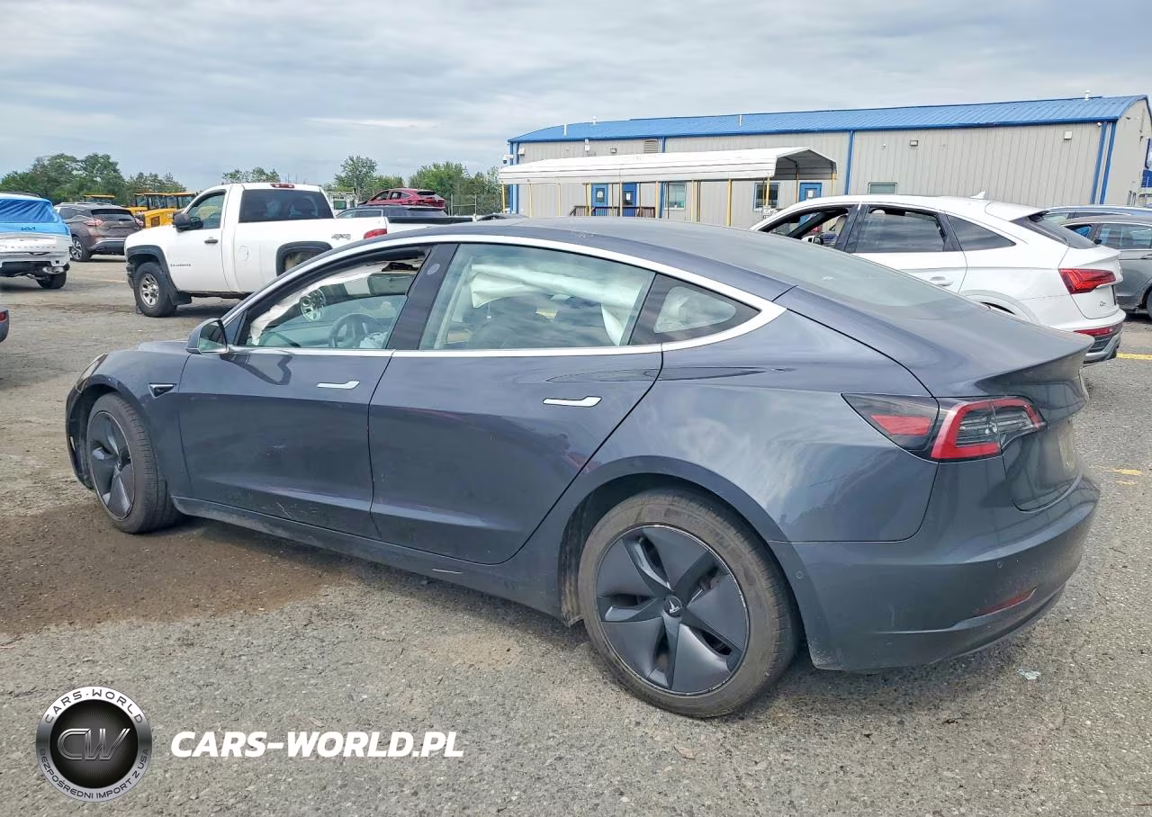 2018 Tesla Model 3 VIN:5YJ3E1EB3JF087099 - 2