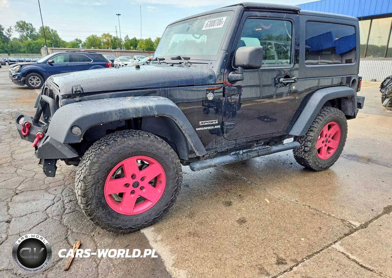 2012 Jeep Wrangler Sport VIN:1C4AJWAGXCL198508 - 1