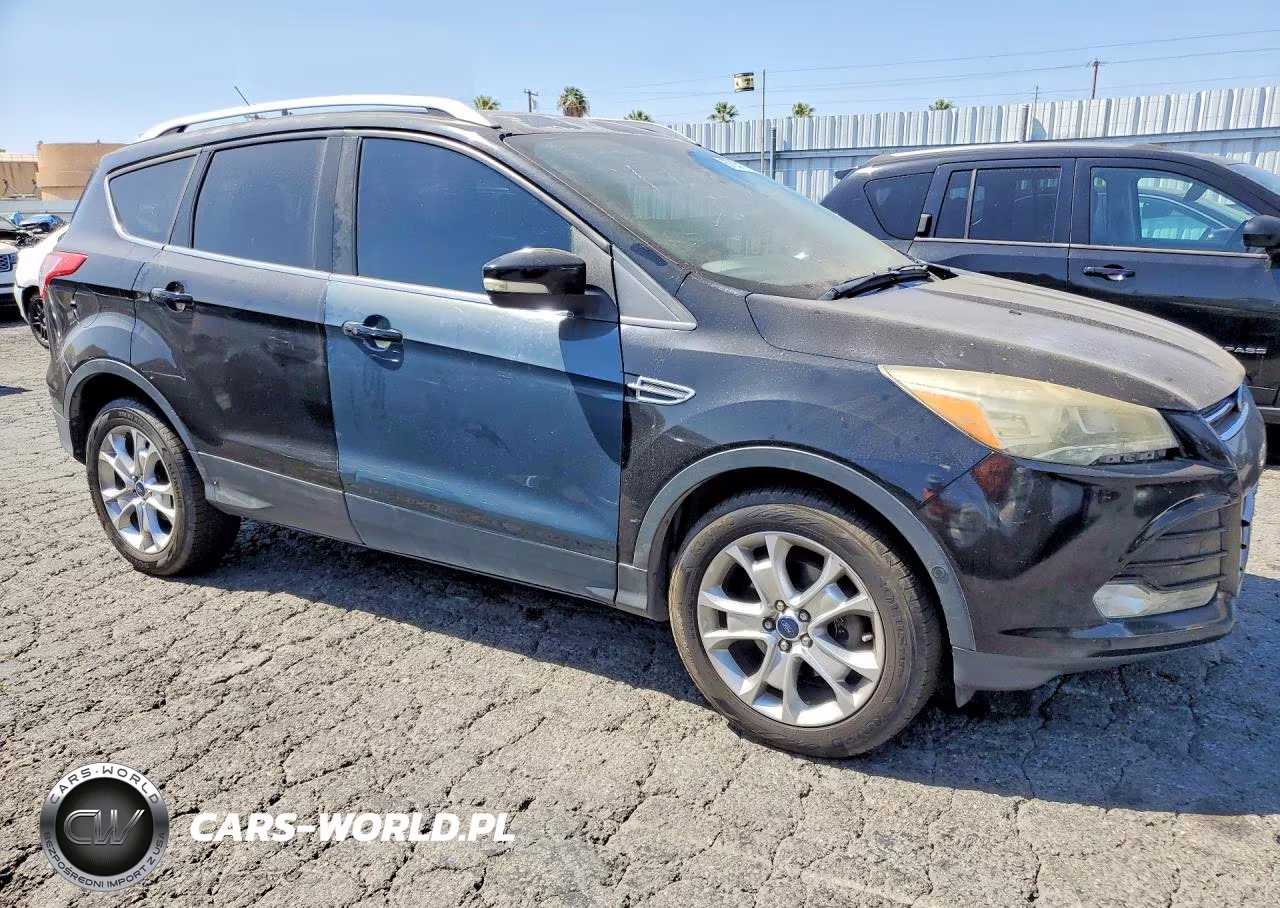 2016 Ford Escape Titanium VIN:1FMCU0JX0GUC43917 - 4
