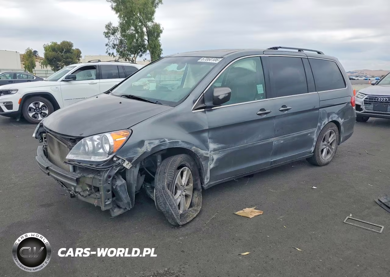 2010 Honda Odyssey Touring VIN:5FNRL3H94AB111544 - 1