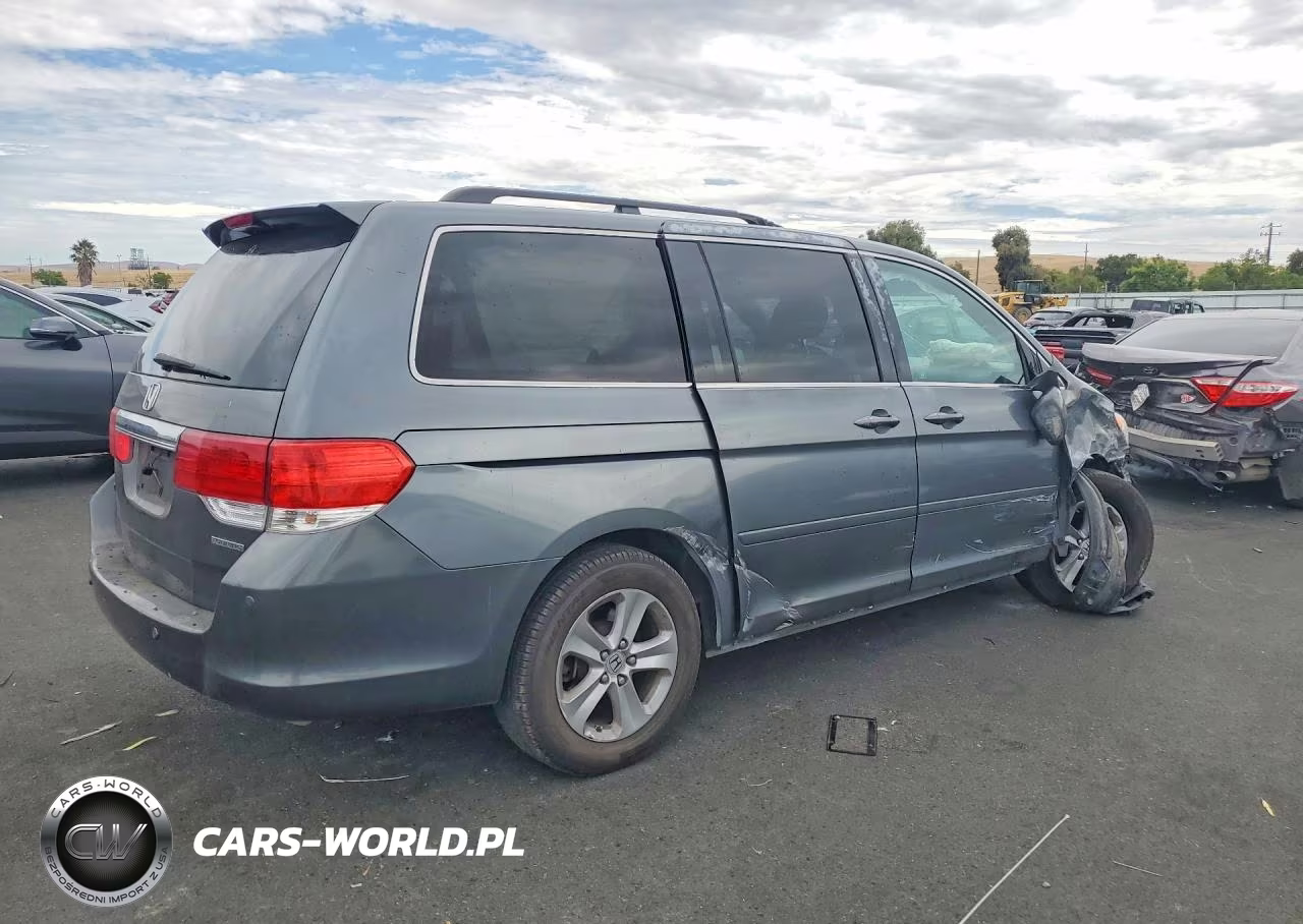 2010 Honda Odyssey Touring VIN:5FNRL3H94AB111544 - 3