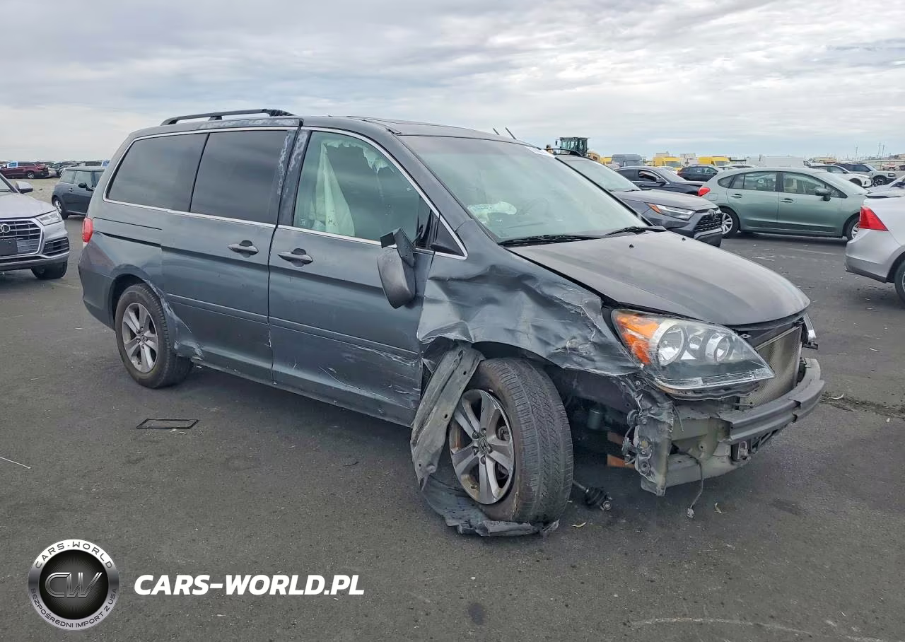 2010 Honda Odyssey Touring VIN:5FNRL3H94AB111544 - 4