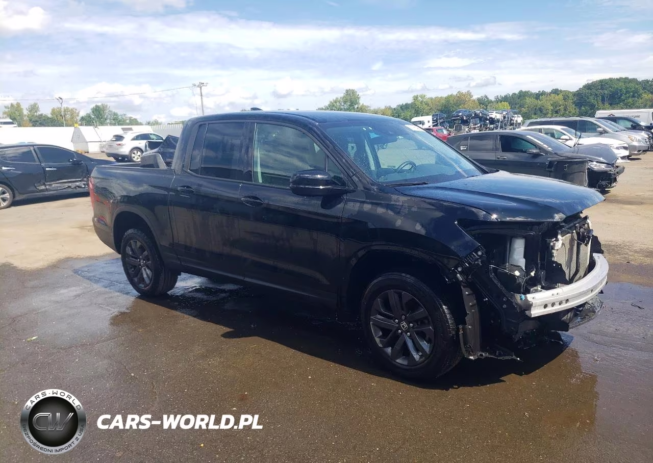 2023 Honda Ridgeline Sport VIN:5FPYK3F1XPB061227 - 4