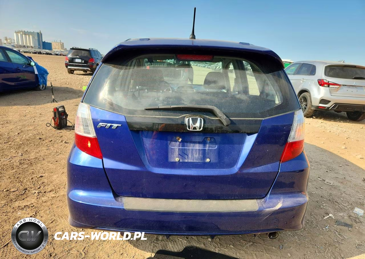 2009 Honda Fit Sport VIN:JHMGE884X9S007737 - 6