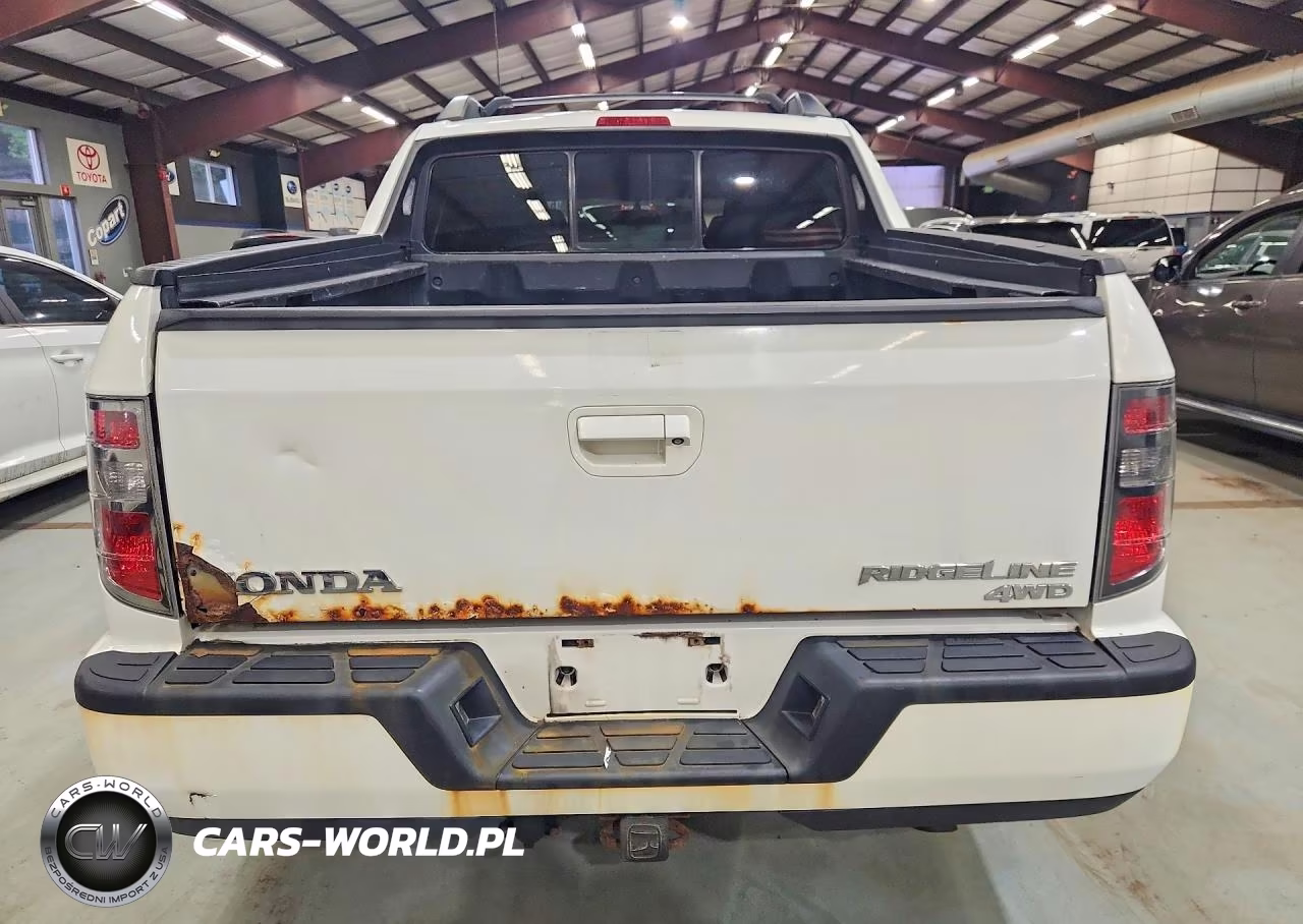 2014 Honda Ridgeline Sport VIN:5FPYK1F77EB009706 - 6