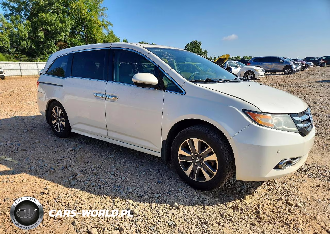 2015 Honda Odyssey Touring VIN:5FNRL5H95FB122832 - 4