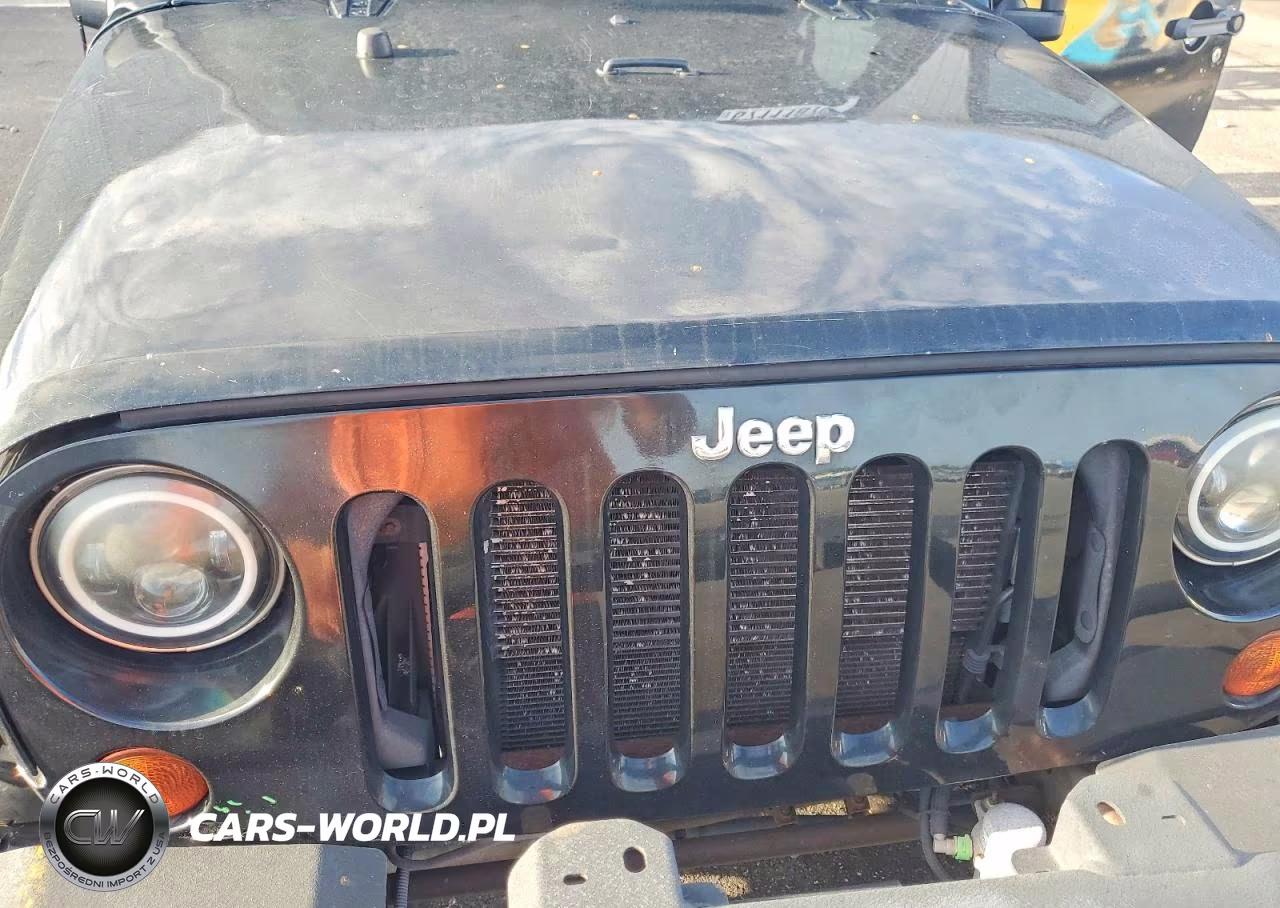 2012 Jeep Wrangler Unlimited Sport VIN:1C4HJWDGXCL182223 - 11