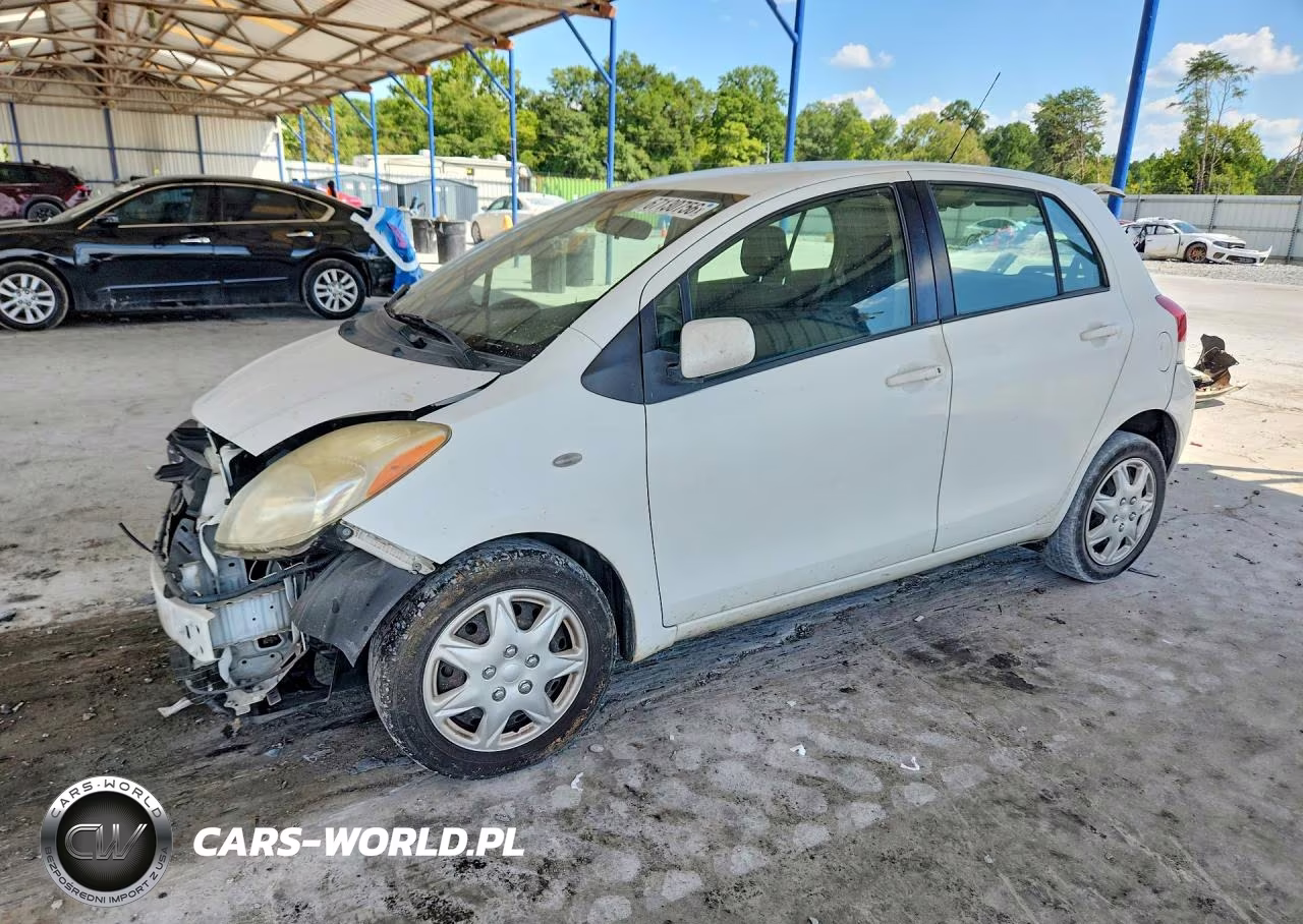 2011 Toyota Yaris Base VIN:JTDKT4K35B5338451 - 1