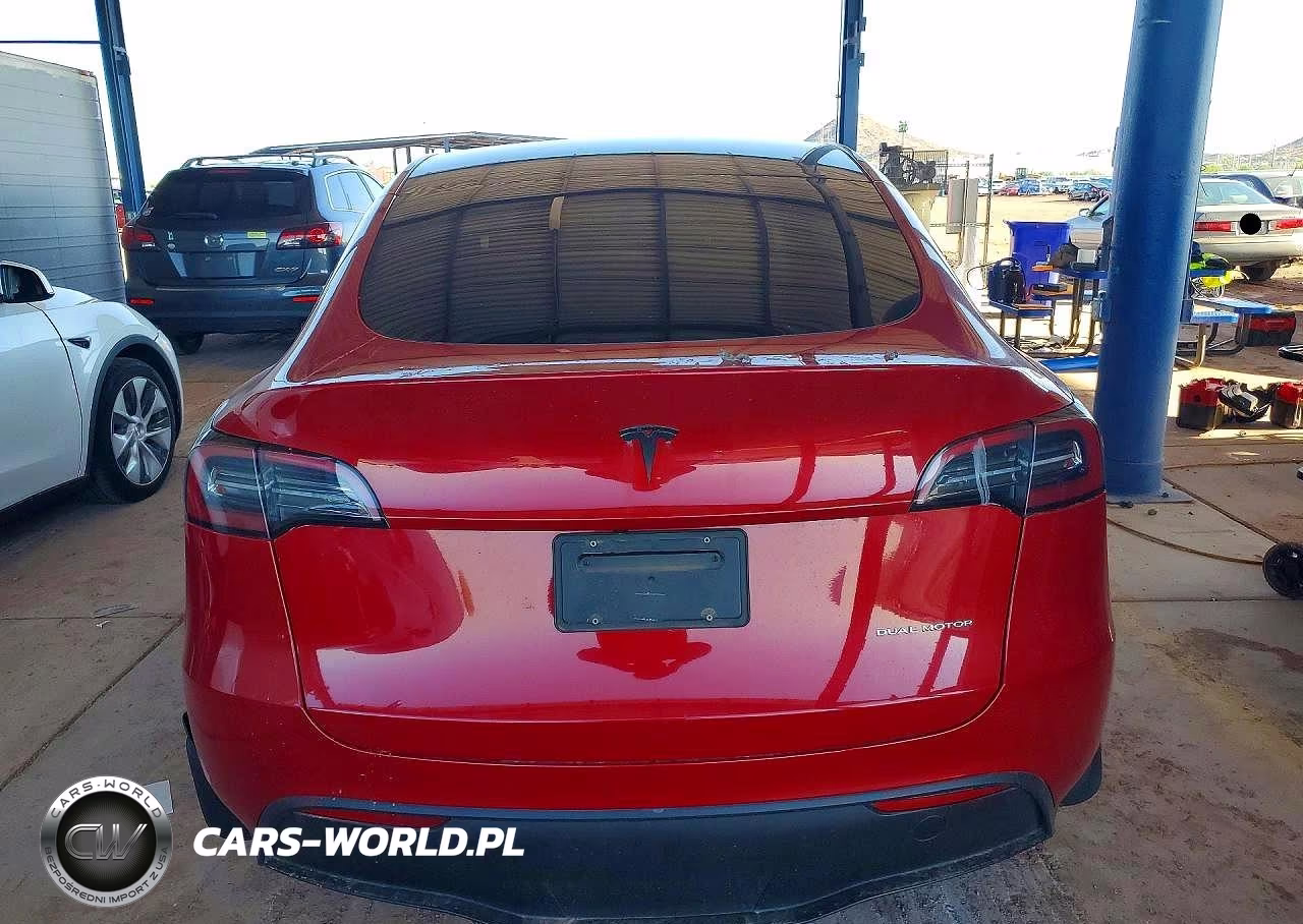 2023 Tesla Model Y VIN:7SAYGDEE3PA113334 - 6