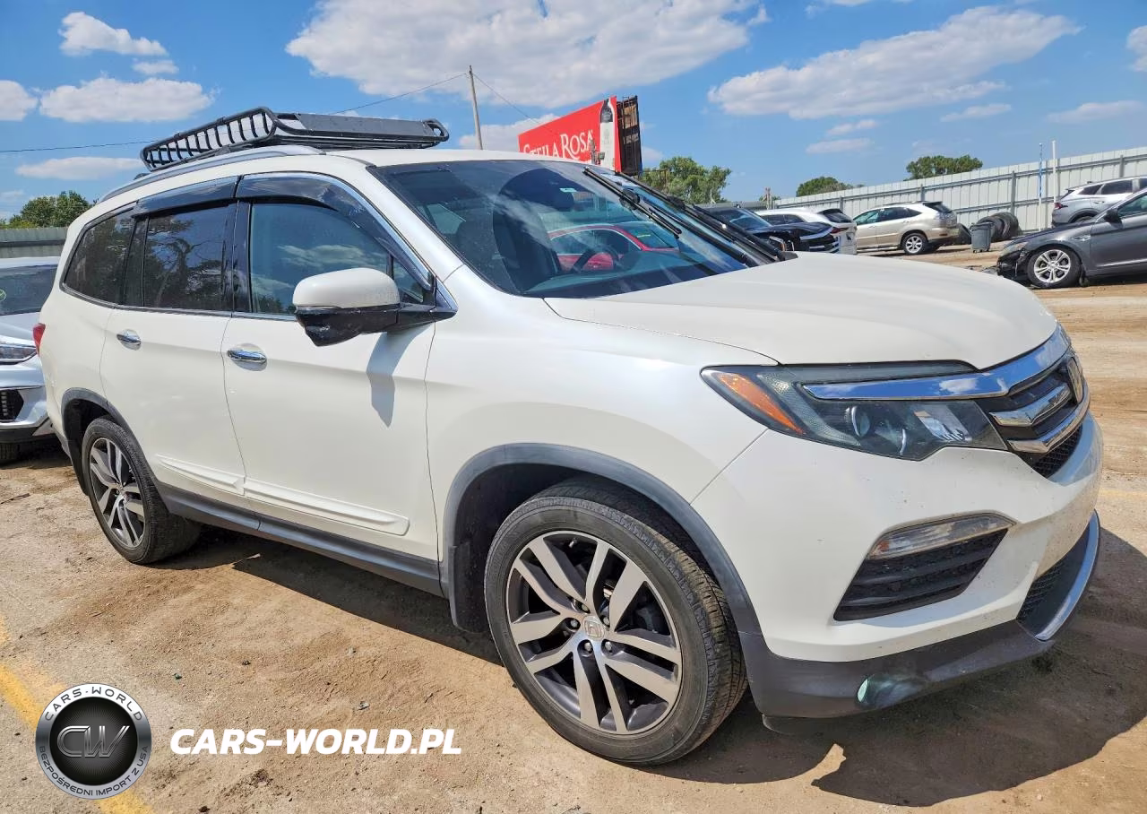 2017 Honda Pilot Touring VIN:5FNYF6H95HB046038 - 4