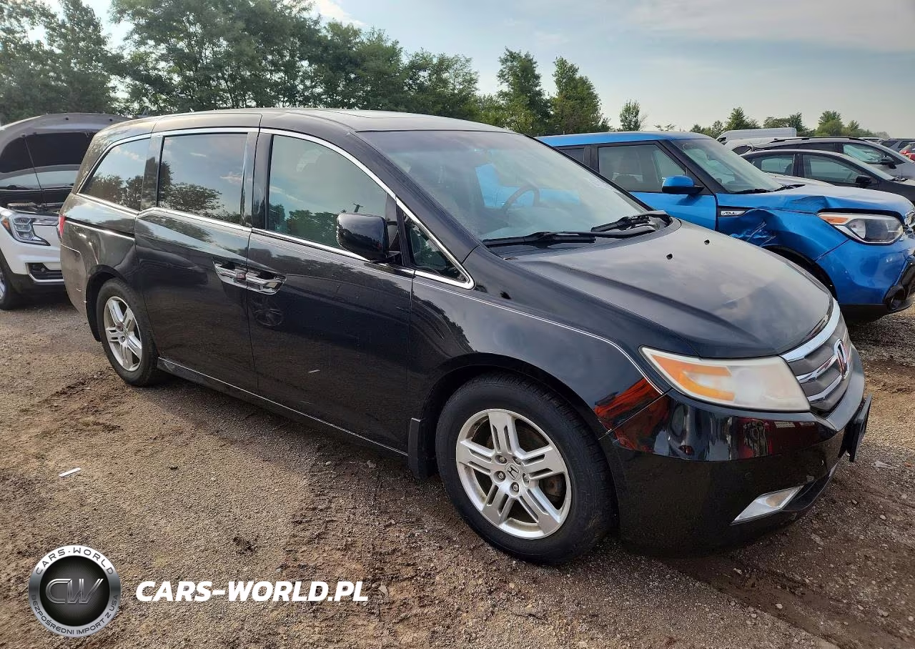 2012 Honda Odyssey Touring VIN:5FNRL5H92CB006290 - 4