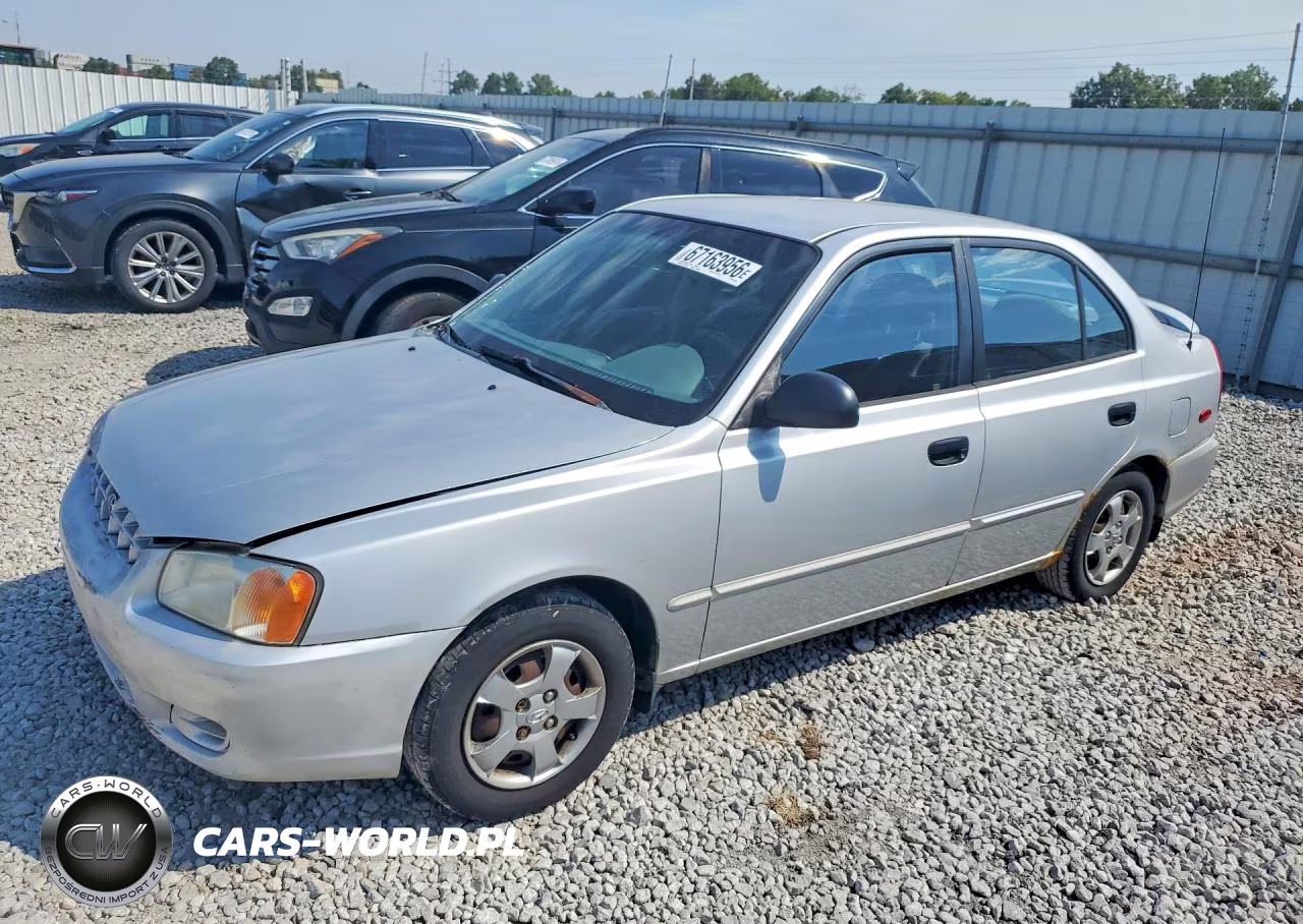 2002 Hyundai Accent Gl VIN:KMHCG45CX2U391250 - 1