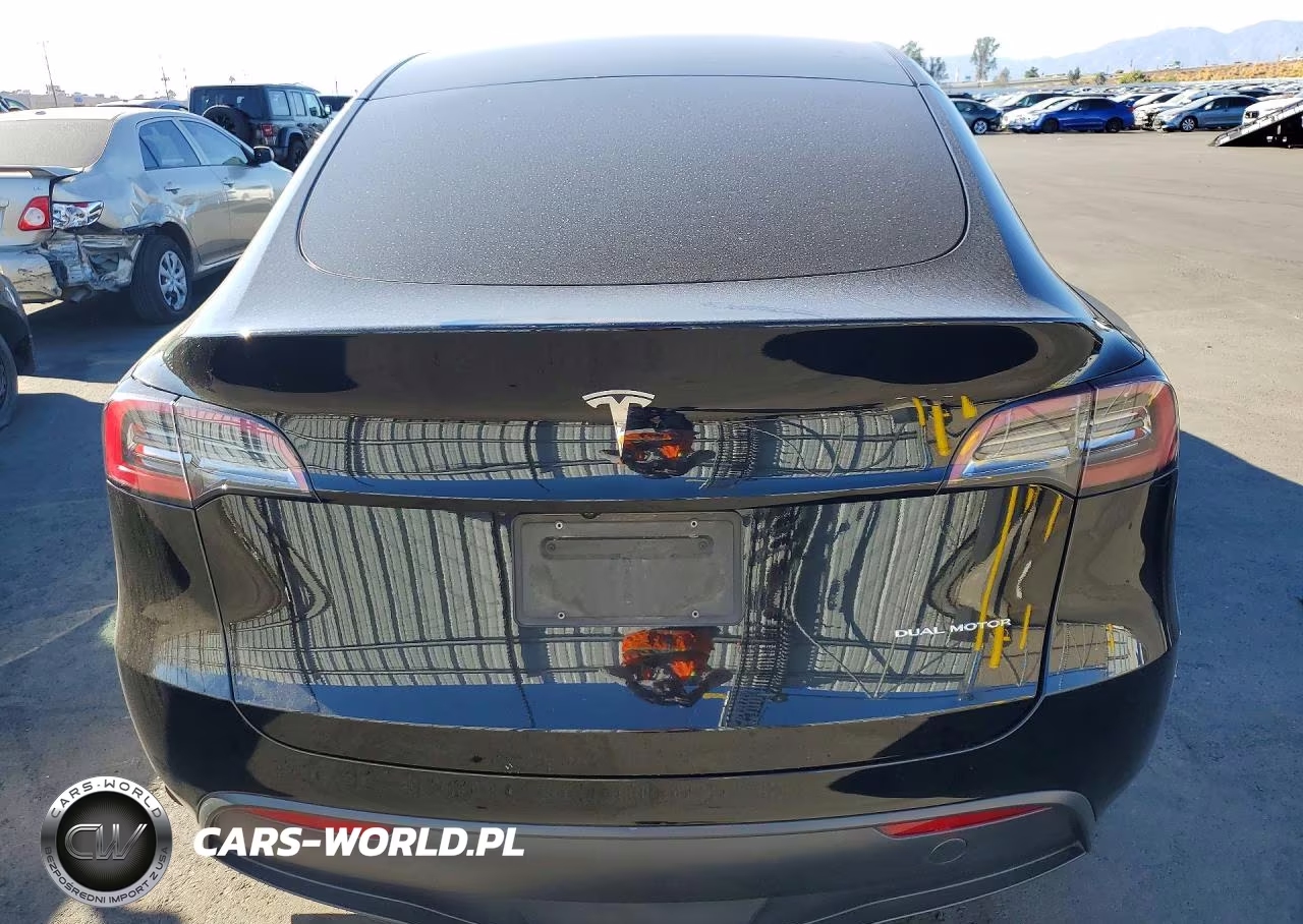2023 Tesla Model Y VIN:7SAYGDEE4PA177365 - 6