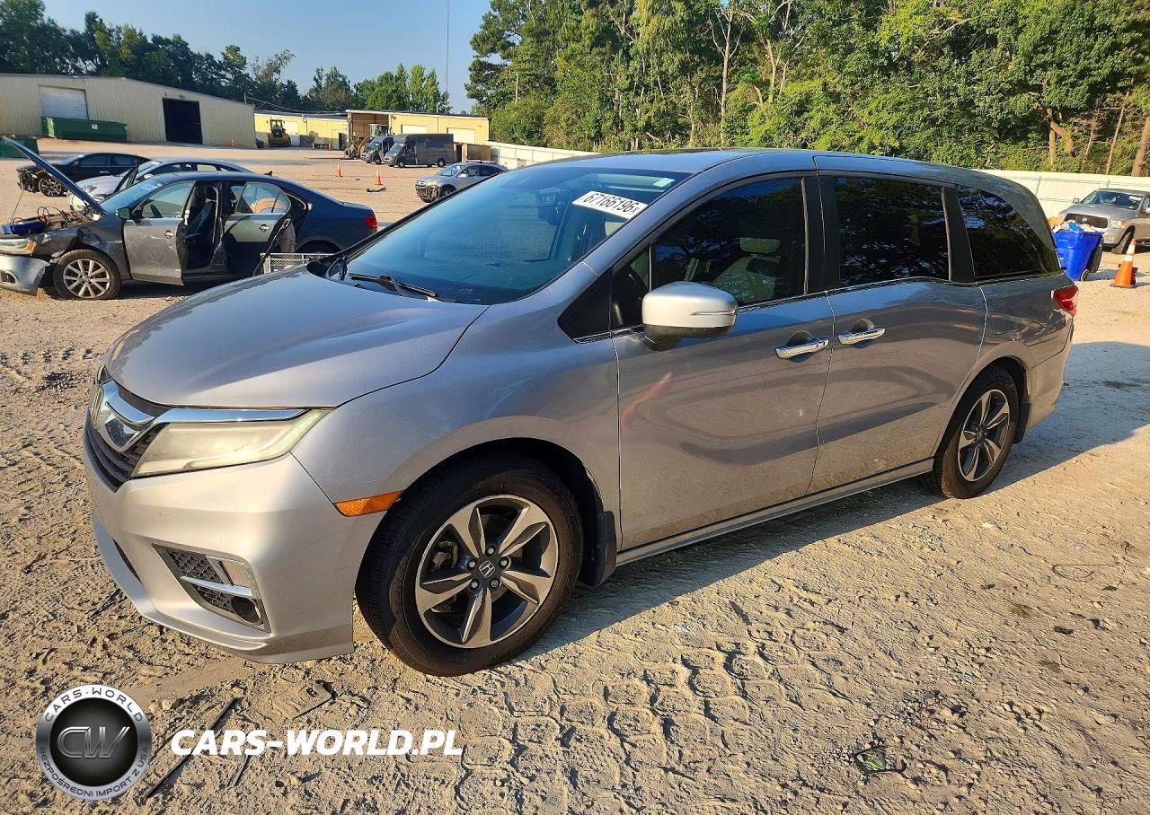 2018 Honda Odyssey Touring VIN:5FNRL6H85JB001790 - 1