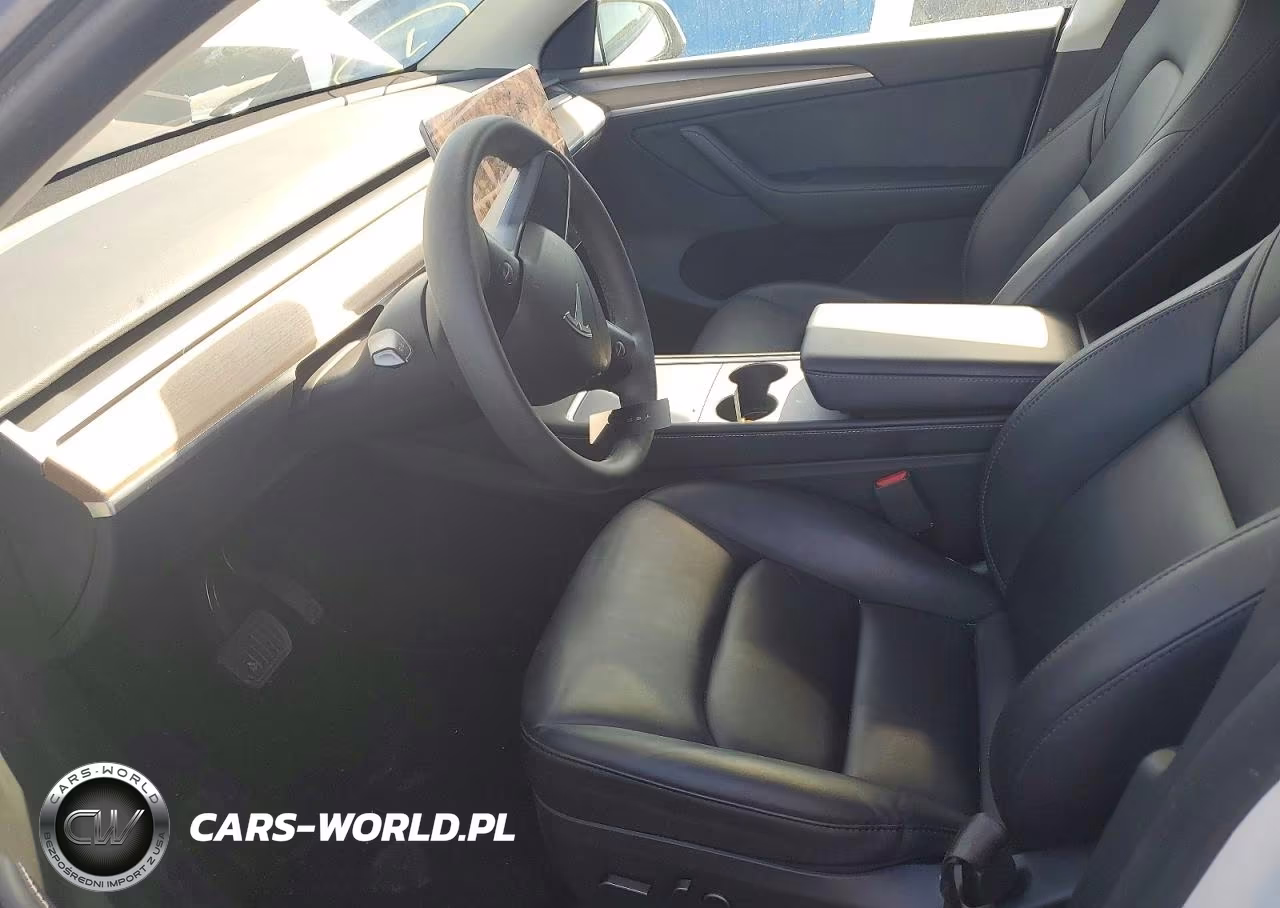 2024 Tesla Model Y VIN:7SAYGDEE5RF989036 - 7