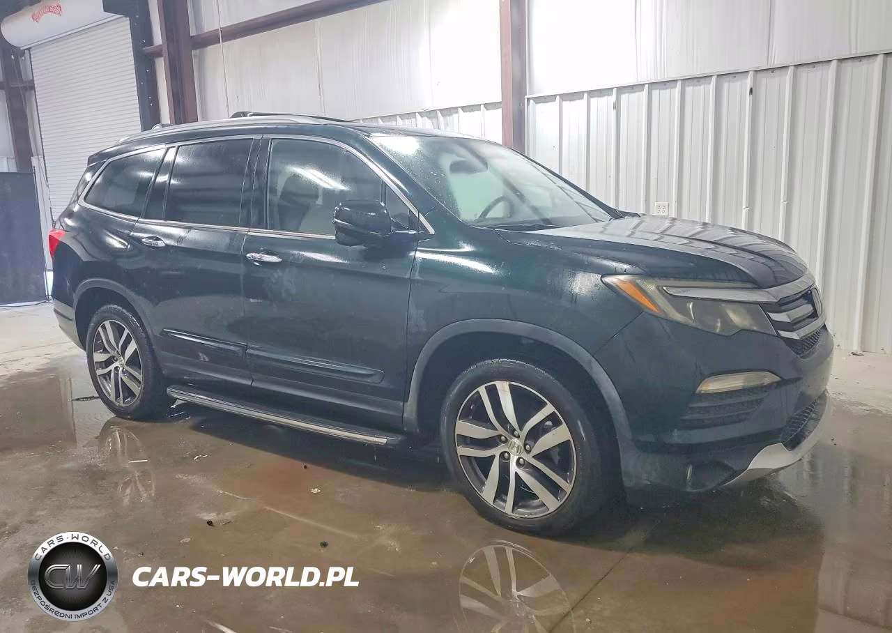 2017 Honda Pilot Touring VIN:5FNYF6H91HB035800 - 4