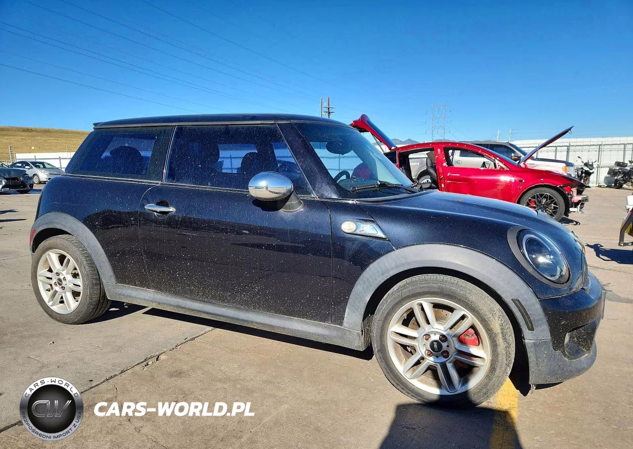 2009 Mini Cooper S VIN:WMWMF73589TT96560 - 4