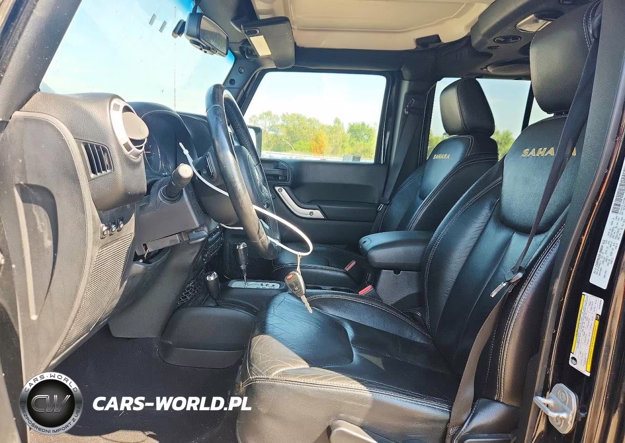 2013 Jeep Wrangler Unlimited Sahara VIN:1C4BJWEG2DL549704 - 7