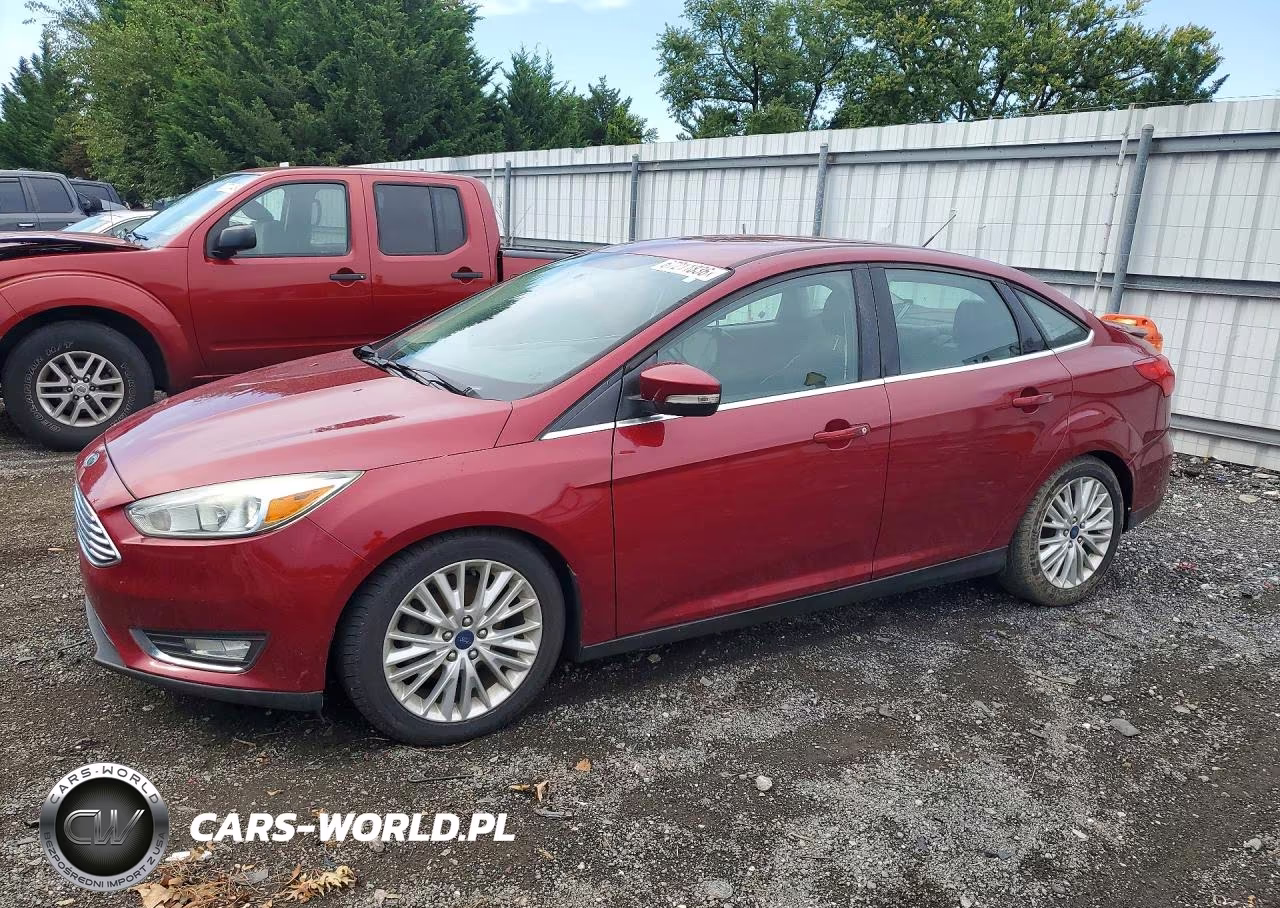 2015 Ford Focus Titanium VIN:1FADP3J24FL273681 - 1