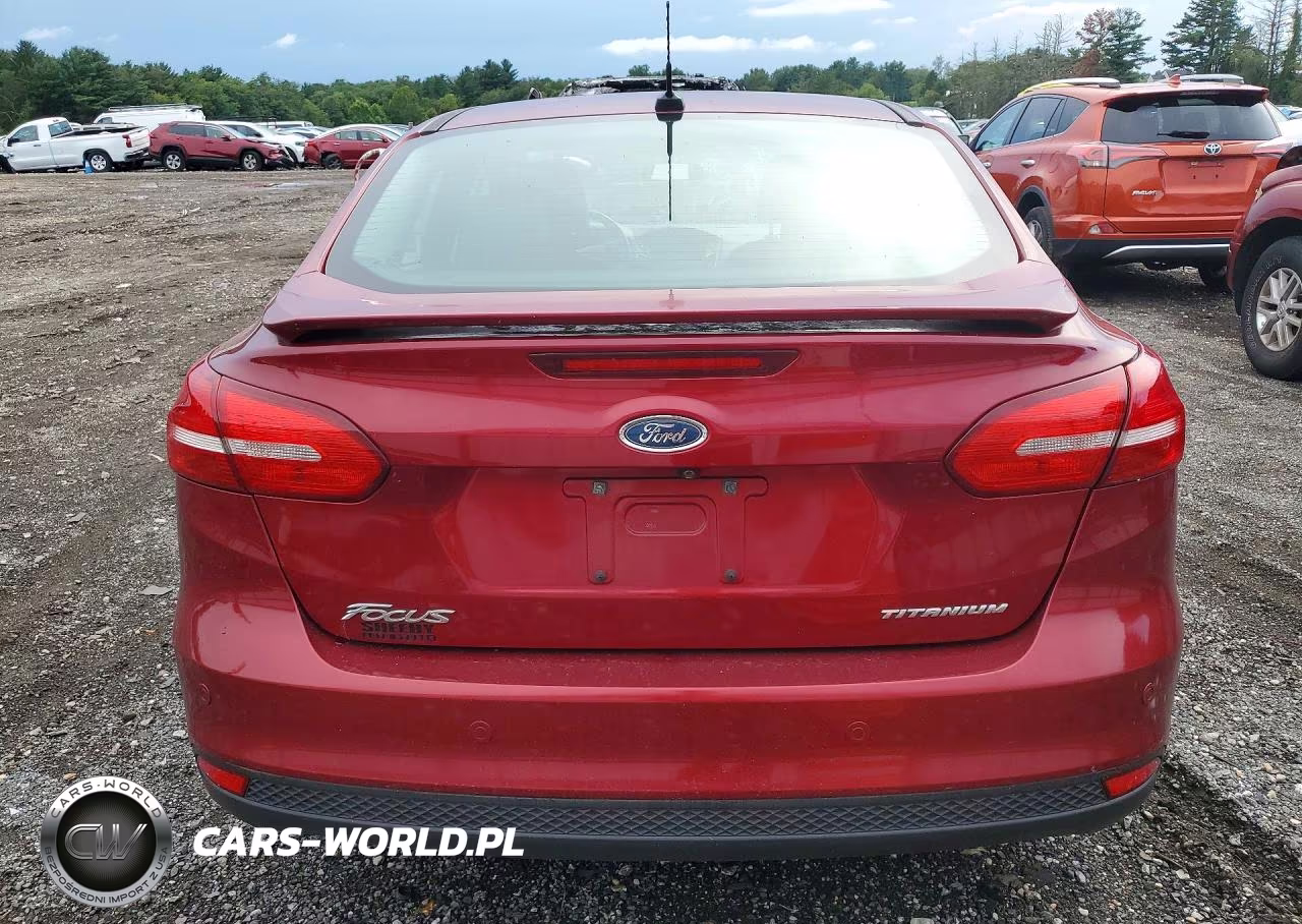 2015 Ford Focus Titanium VIN:1FADP3J24FL273681 - 6
