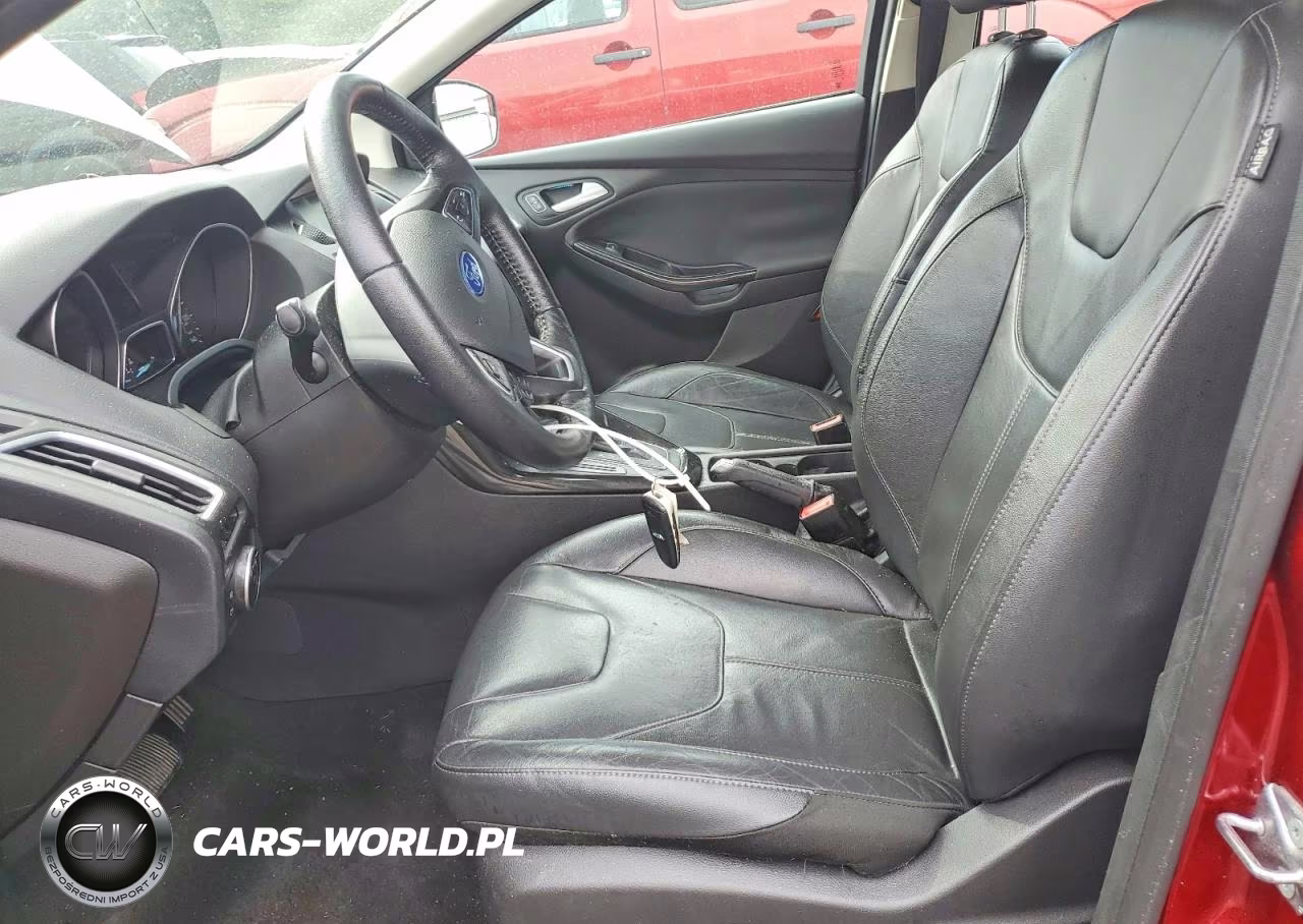 2015 Ford Focus Titanium VIN:1FADP3J24FL273681 - 7