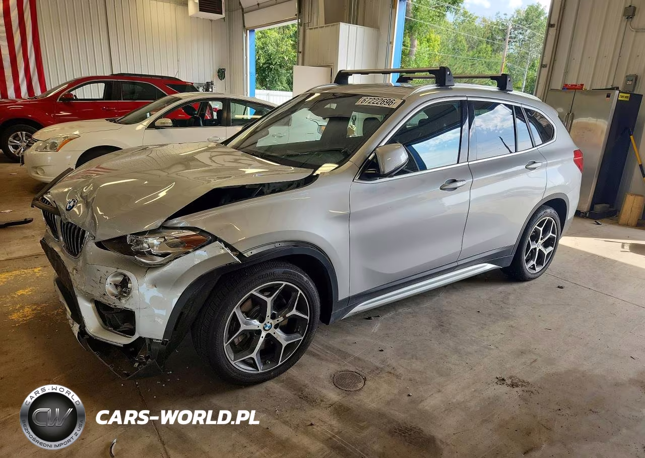2018 BMW X1 xDrive28I VIN:WBXHT3C34J5L33469 - 1