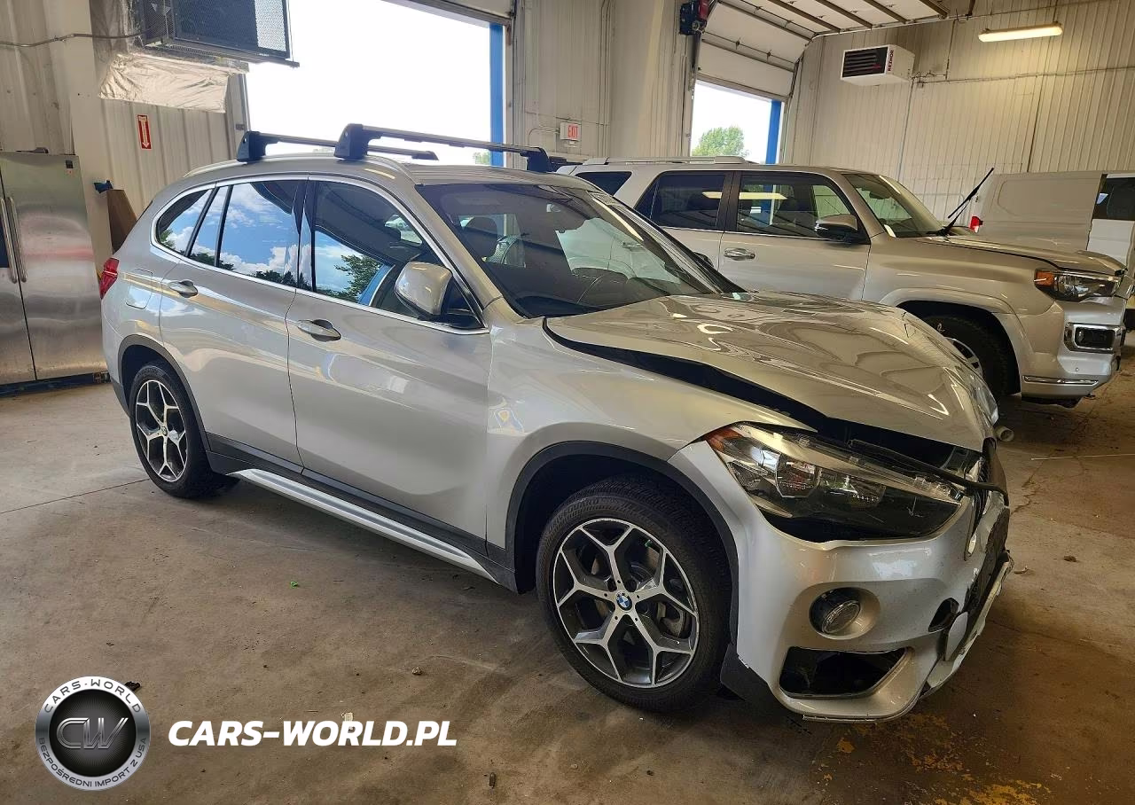 2018 BMW X1 xDrive28I VIN:WBXHT3C34J5L33469 - 4
