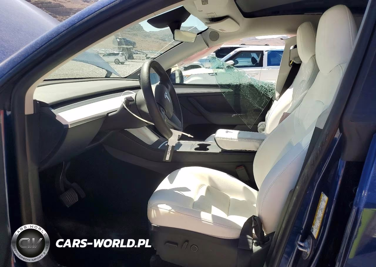 2023 Tesla Model Y VIN:7SAYGAEE2PF945068 - 7