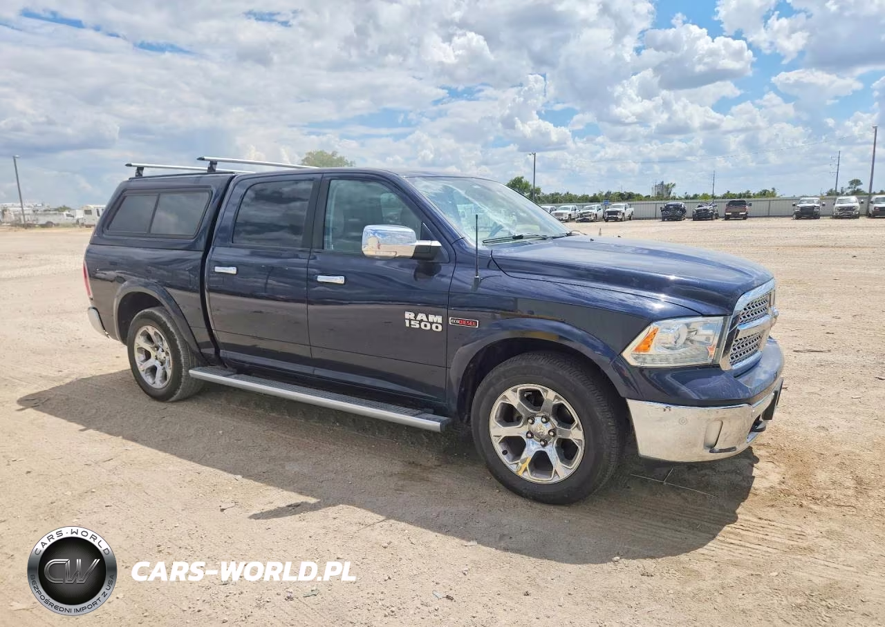 2015 Ram 1500 Laramie VIN:1C6RR7NM3FS513992 - 4