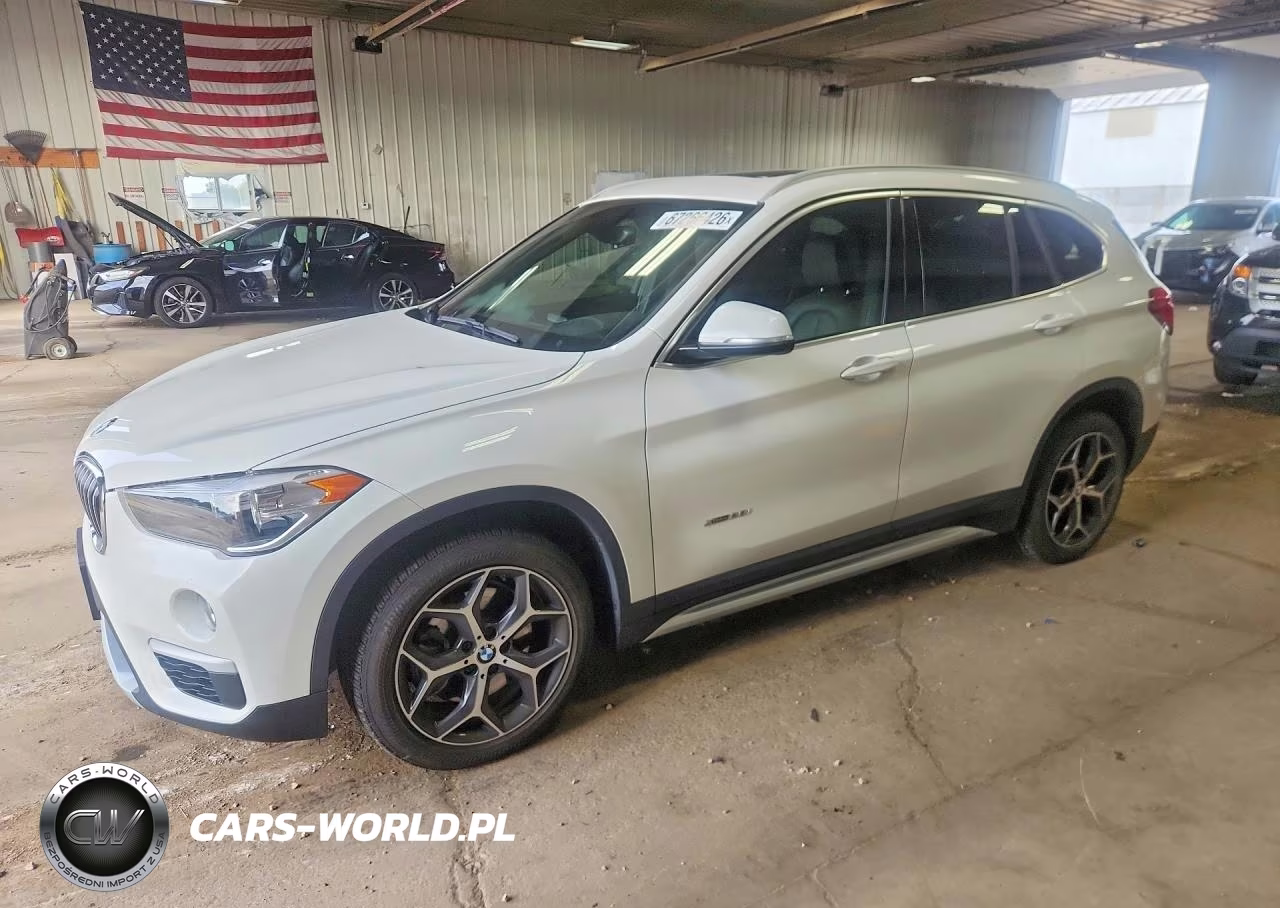 2018 BMW X1 xDrive28I VIN:WBXHT3C31J5K25682 - 1