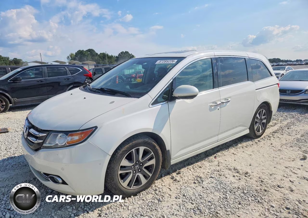 2014 Honda Odyssey Touring VIN:5FNRL5H96EB123339 - 1