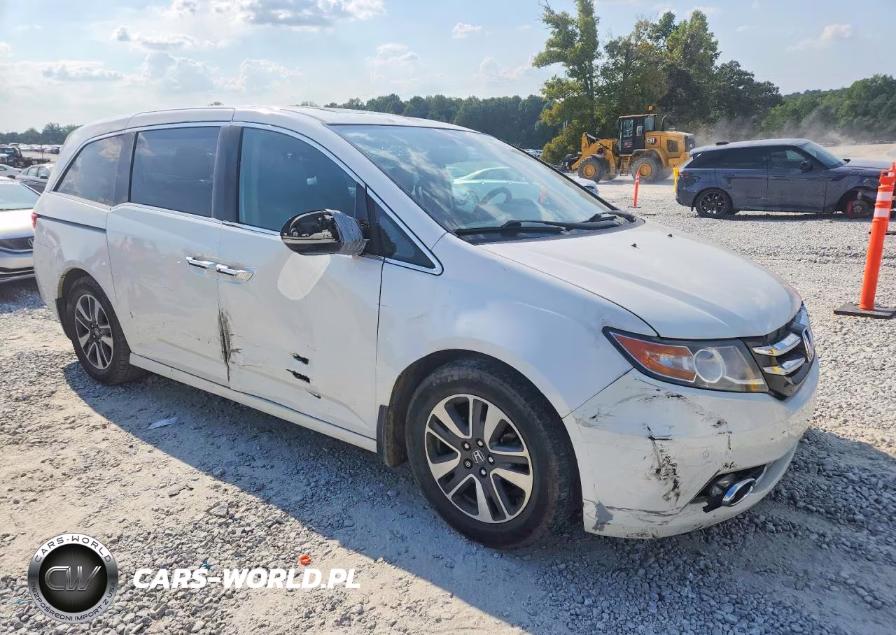 2014 Honda Odyssey Touring VIN:5FNRL5H96EB123339 - 4