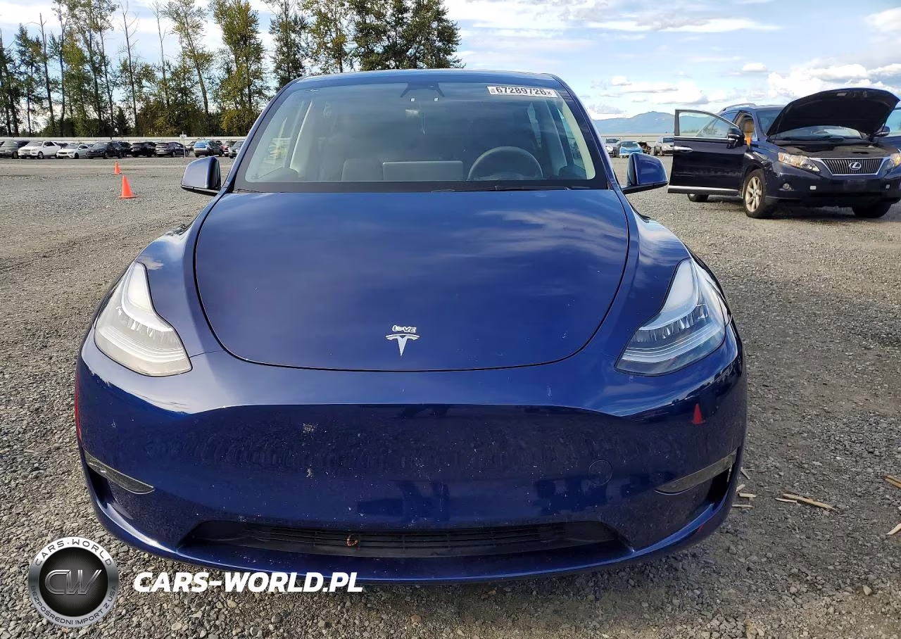 2023 Tesla Model Y VIN:7SAYGAEE2PF602129 - 5