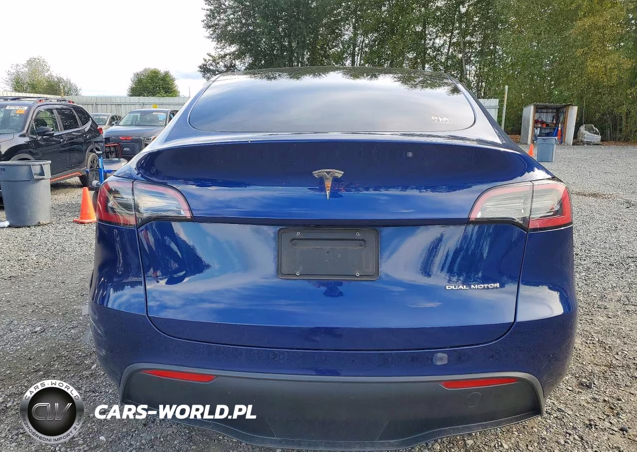 2023 Tesla Model Y VIN:7SAYGAEE2PF602129 - 6