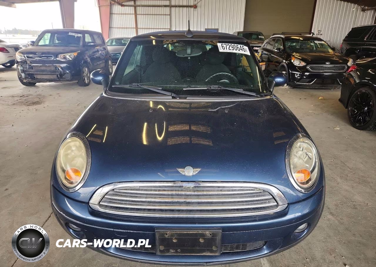 2009 Mini Cooper VIN:WMWMR33529TZ18664 - 5
