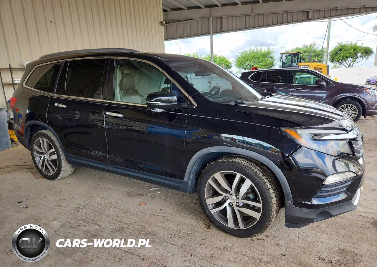 2017 Honda Pilot Touring VIN:5FNYF5H9XHB022991 - 4