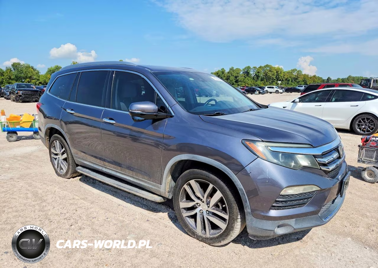 2017 Honda Pilot Touring VIN:5FNYF6H92HB041170 - 4