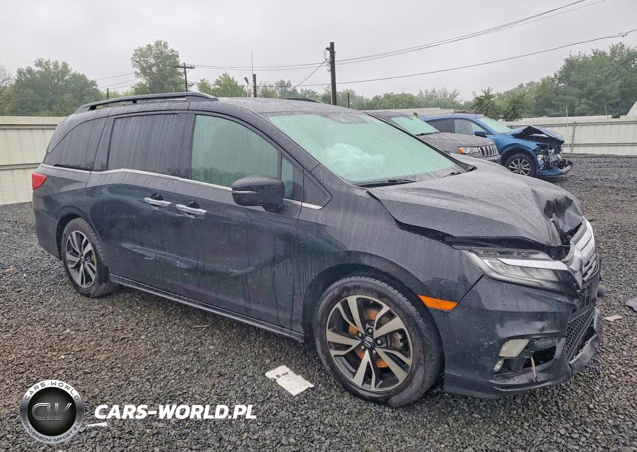 2018 Honda Odyssey Elite VIN:5FNRL6H98JB052760 - 4