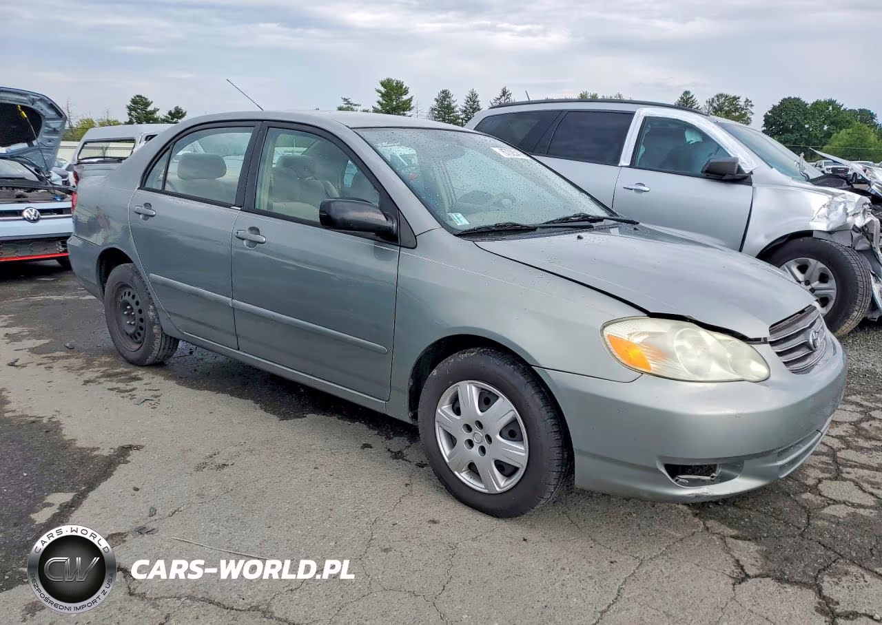 2003 Toyota Corolla Le VIN:1NXBR38E23Z023871 - 4