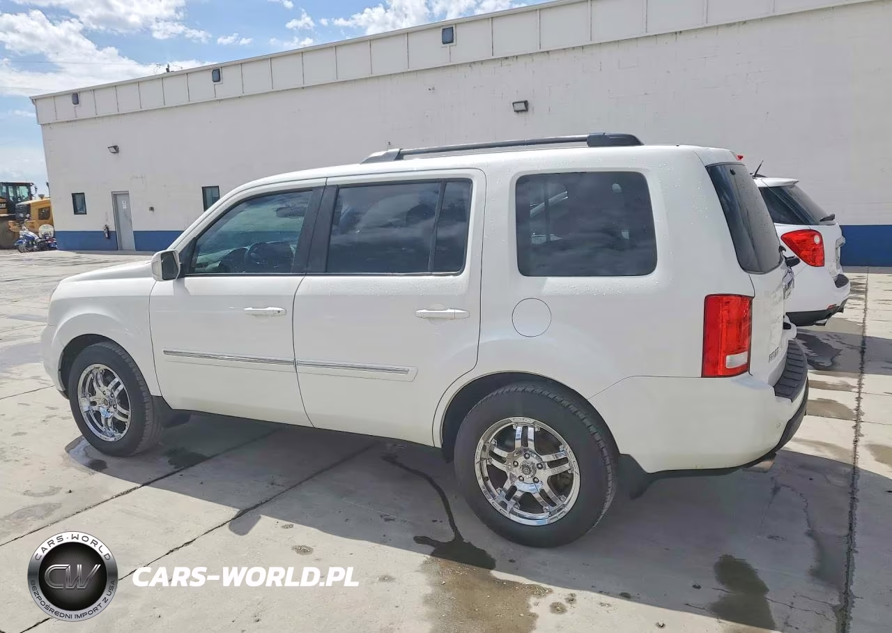 2011 Honda Pilot Touring VIN:5FNYF4H91BB066475 - 2