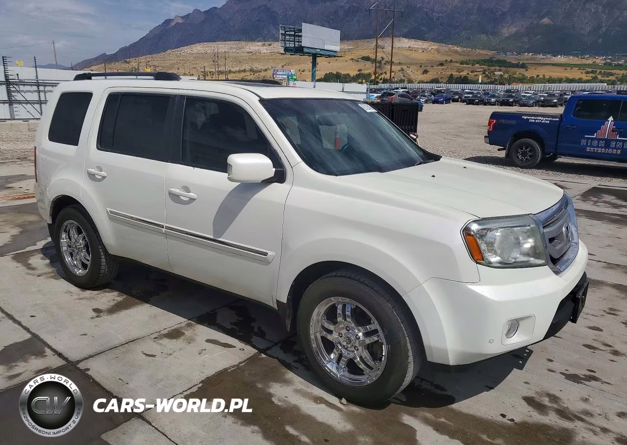 2011 Honda Pilot Touring VIN:5FNYF4H91BB066475 - 4