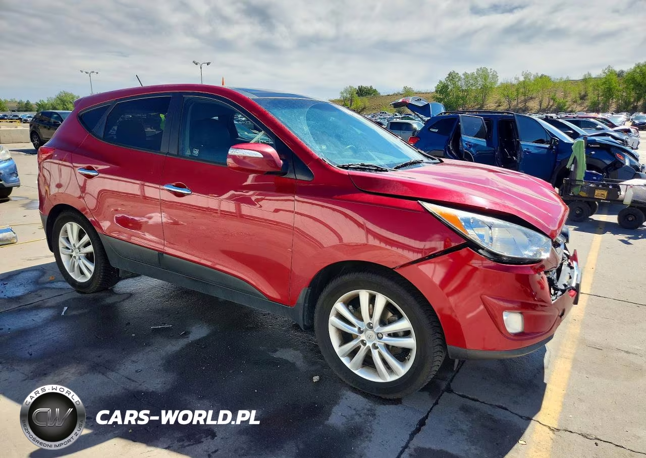 2012 Hyundai Tucson Limited VIN:KM8JUCACXCU509945 - 4