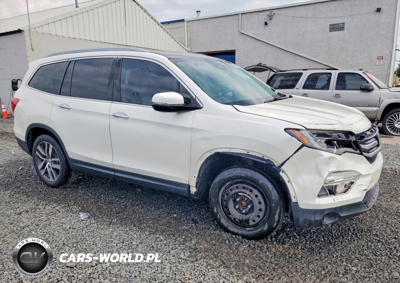 2017 Honda Pilot Elite VIN:5FNYF6H0XHB051298 - 4