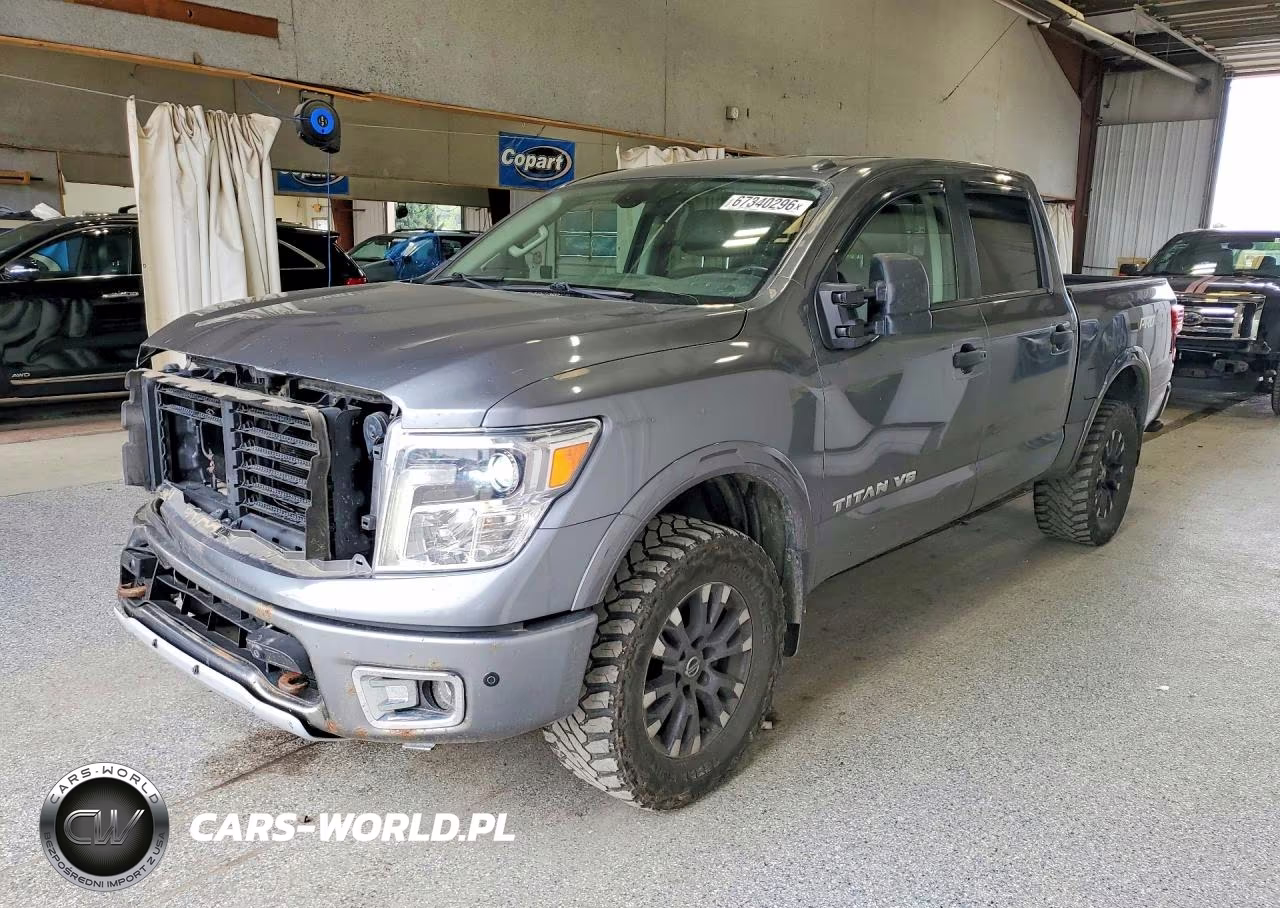 2018 Nissan Titan Pro-4X VIN:1N6AA1E5XJN514242 - 1