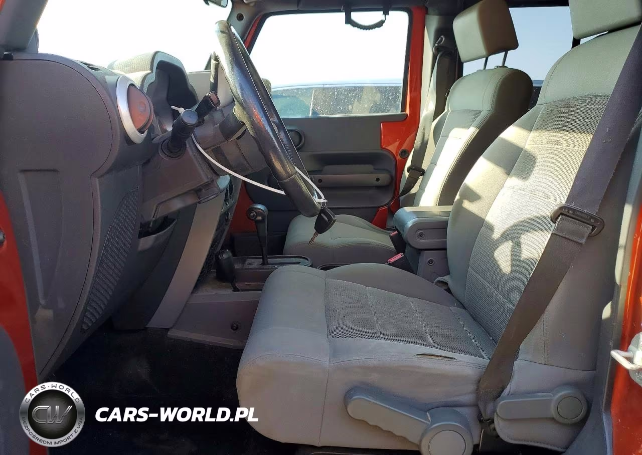 2009 Jeep Wrangler Unlimited Sahara VIN:1J4GA591X9L754419 - 7