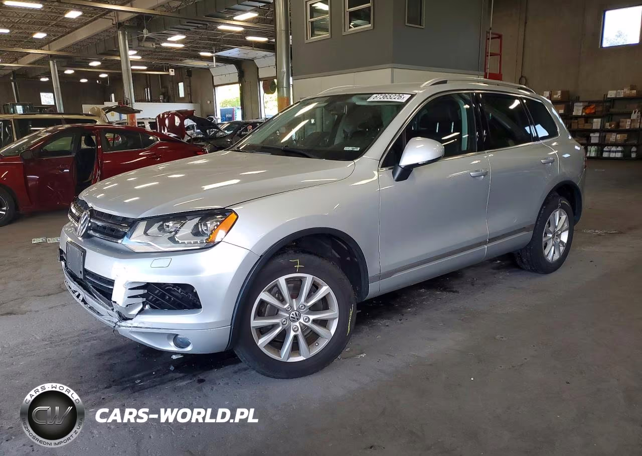 2014 Volkswagen Touareg V6 VIN:WVGEF9BP2ED001438 - 1